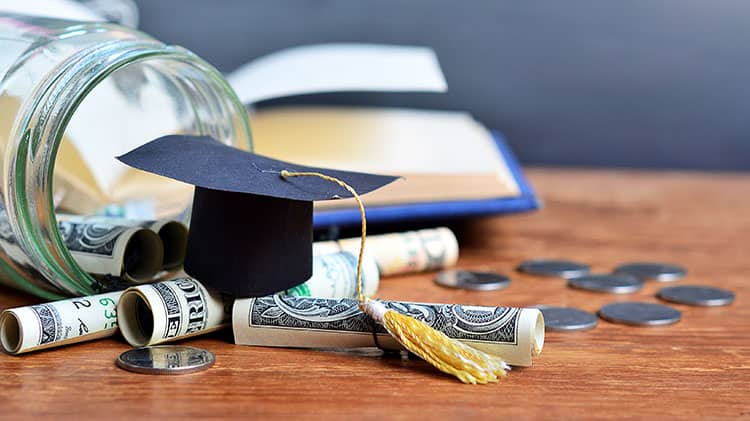 scholarship money grad cap